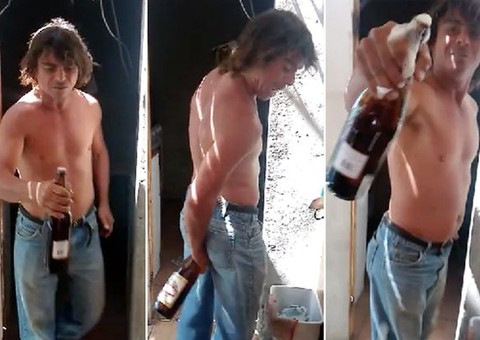 Homem abre garrafa de cerveja com a bunda. Veja