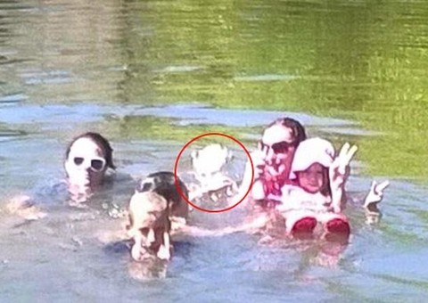 Assustador: Fantasma de criança que morreu afogada aparece em foto de família no lago