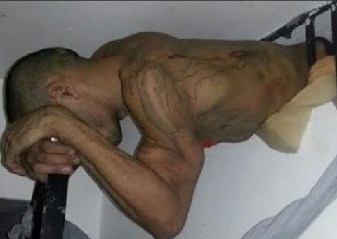 Preso serra vergalhão, tenta fugir, mas fica entalado 