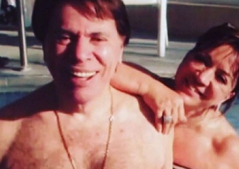 Silvio Santos surpreende ao aparecer sem camisa em piscina com a mulher