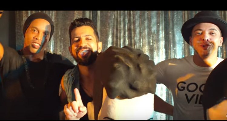 Ronaldinho Gaúcho e Safadão fazem nova parceria em clipe 'Professor da Malandragem'