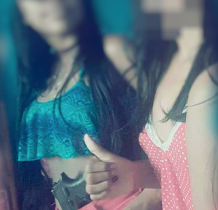 Em Manaus, jovem é presa e adolescente apreendida suspeitas de 'ostentar' armas de traficantes no facebook