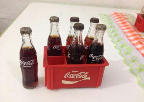 Fim do mistério! Saiba o que tinha dentro da miniatura da Coca-Cola