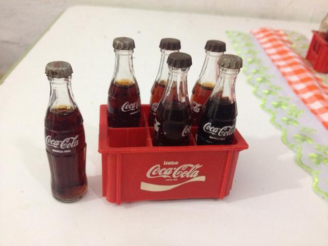 Fim do mistério! Saiba o que tinha dentro da miniatura da Coca-Cola