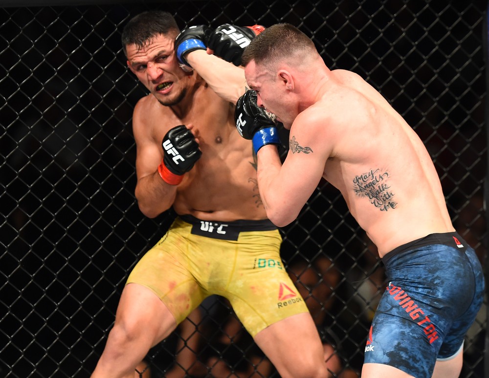 Depois de vencer Rafael dos Anjos, Covington revolta público ao chamar brasileiro de 'animal imundo'