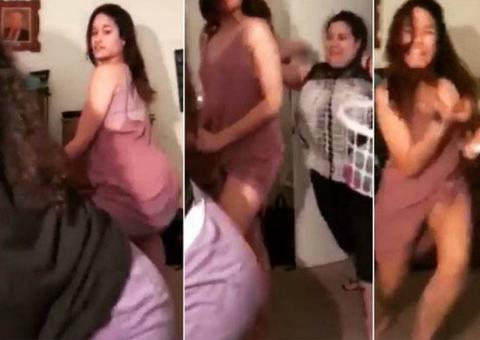 Mãe dá surra de chinelada nas filhas após serem flagradas dançando na web