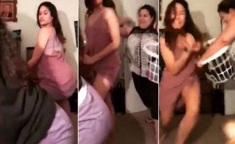 Mãe dá surra de chinelada nas filhas após serem flagradas dançando na web