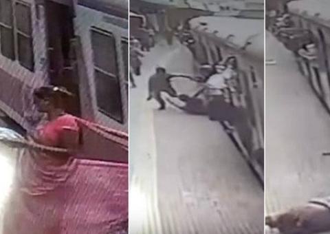 Mulher é arrastada por trem e escapa da morte 