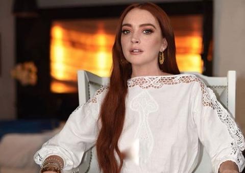 Bizarro! Lindsay Lohan tenta 'pegar' filho de imigrantes, os persegue e acaba levando soco; vídeo
