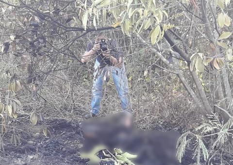 Carbonizado e com faca cravada, corpo é encontrado em avenida de Manaus