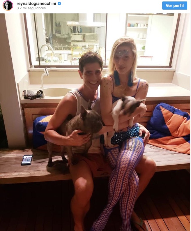 Com fama de gay, Gianecchini aparece com mulher misteriosa no colo e detalhe no corpo chama atenção