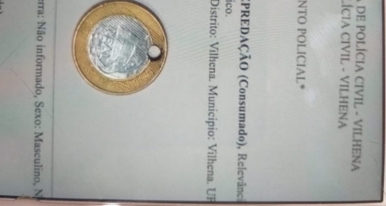 Jovem fura moeda de 1 real, usa como pingente e acaba preso 