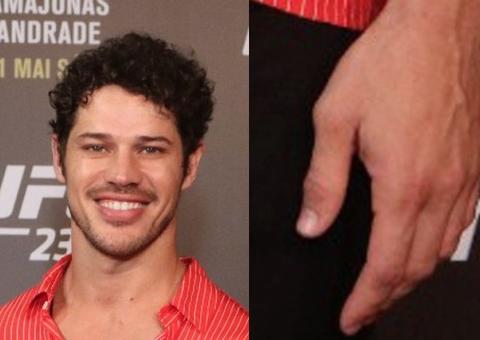 No UFC, José Loreto surge sem aliança e foge de perguntas sobre casamento com Débora Nascimento