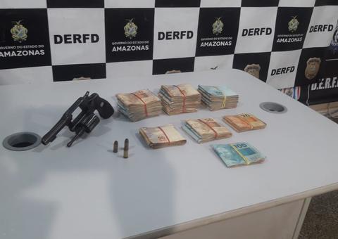Suspeitos de roubar R$ 33 mil são presos no momento em que dividiam dinheiro em Manaus 