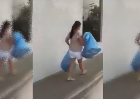 Vídeo: mulher descobre que foi traída e deixa roupas do marido em agência bancária