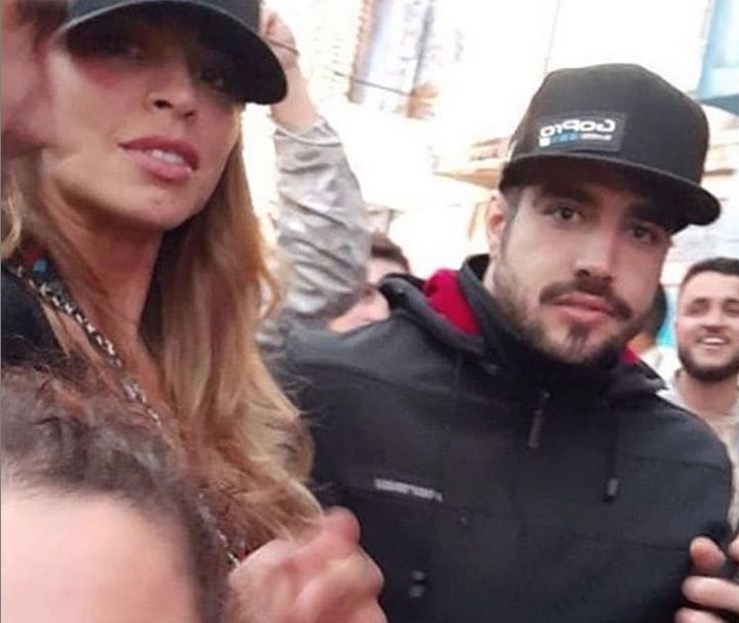 Grazi Massafera e Caio Castro curtem show do Rock in Rio agarradinhos