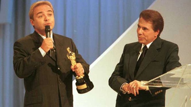 Chances de Silvio Santos comparecer a velório de Gugu são mínimas, diz site