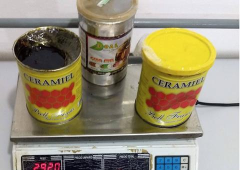 Mulher é presa ao tentar embarcar para Manaus com haxixe escondido em latas de cera
