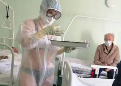 Enfermeira é suspensa por usar roupa íntima sob EPI transparente