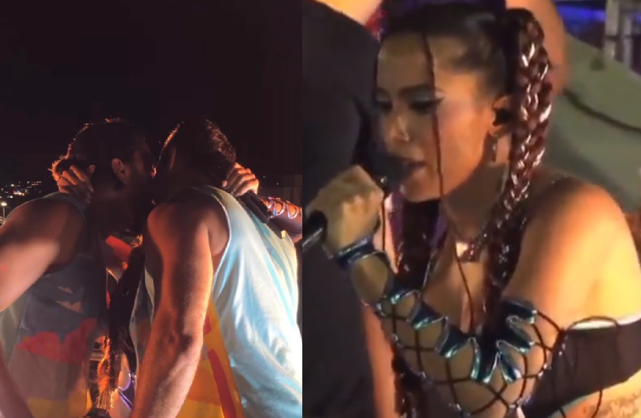 Anitta dá beijo triplo em casal de fãs durante trio elétrico