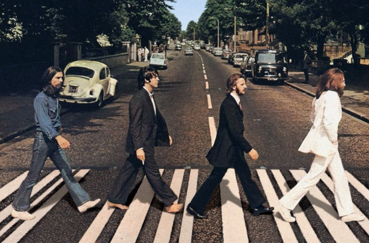 Mulher surta ao perceber um dos Beatles em sua foto