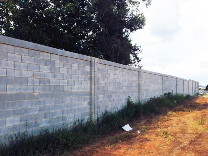 Vizinhos devem dividir custo de muro construído entre imóveis; entenda