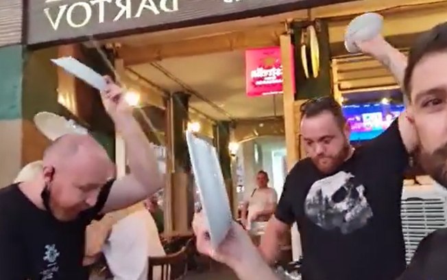 Dono de hotel surta e quebra pratos em protesto contra lockdown; vídeo