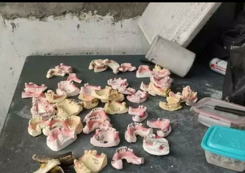 Oficina é fechada por reformar próteses dentárias roubadas de cemitérios