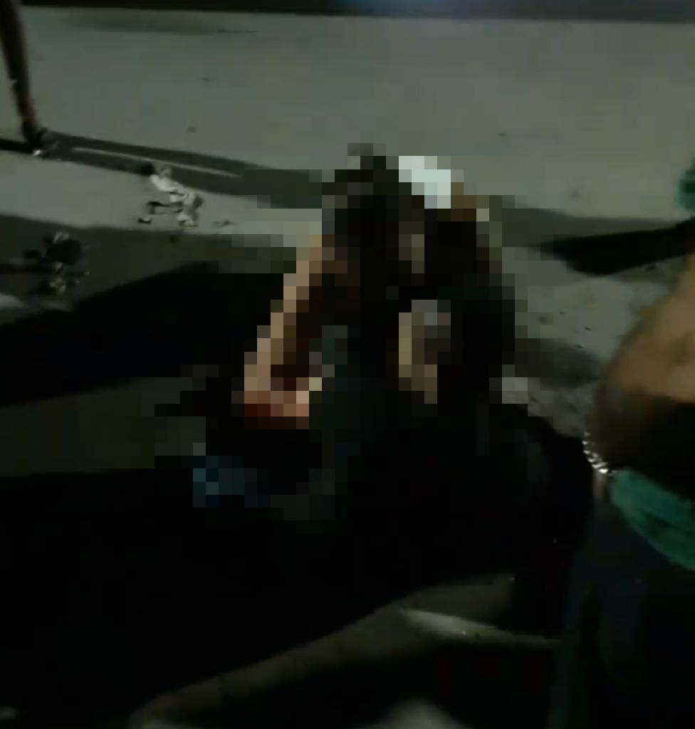 Mulher se desespera ao encontrar marido morto a tiros em bar de Manaus