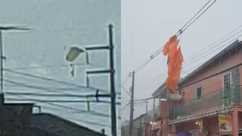 Vídeos: Paraquedista cai em fios de energia durante chuva em Manaus