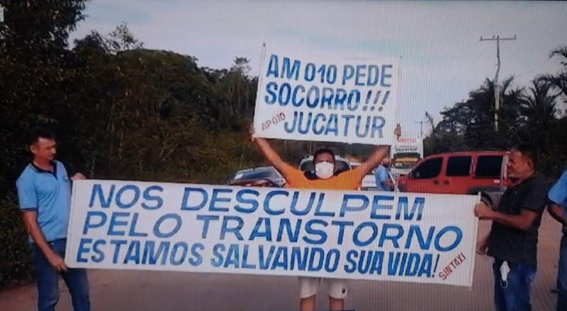 Taxistas voltam a bloquear AM-010 em protesto por melhorias, no Amazonas; vídeo