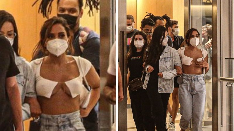 Sem sutiã, Anitta ousa com top branco em dia de cinema com Juliette