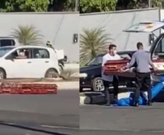 Caixão despenca de carro de funerária no meio de avenida