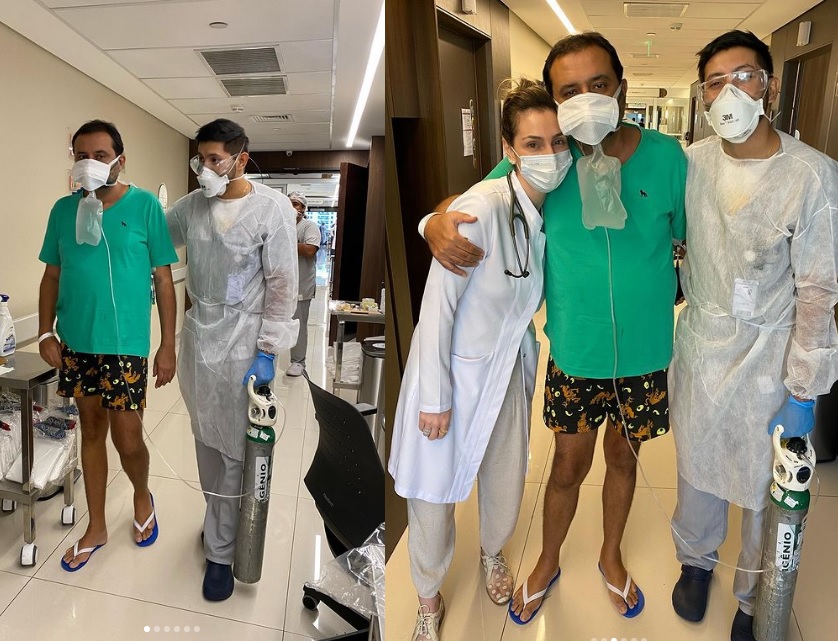 Geraldo Luís caminha com cilindro de oxigênio em corredor de UTI