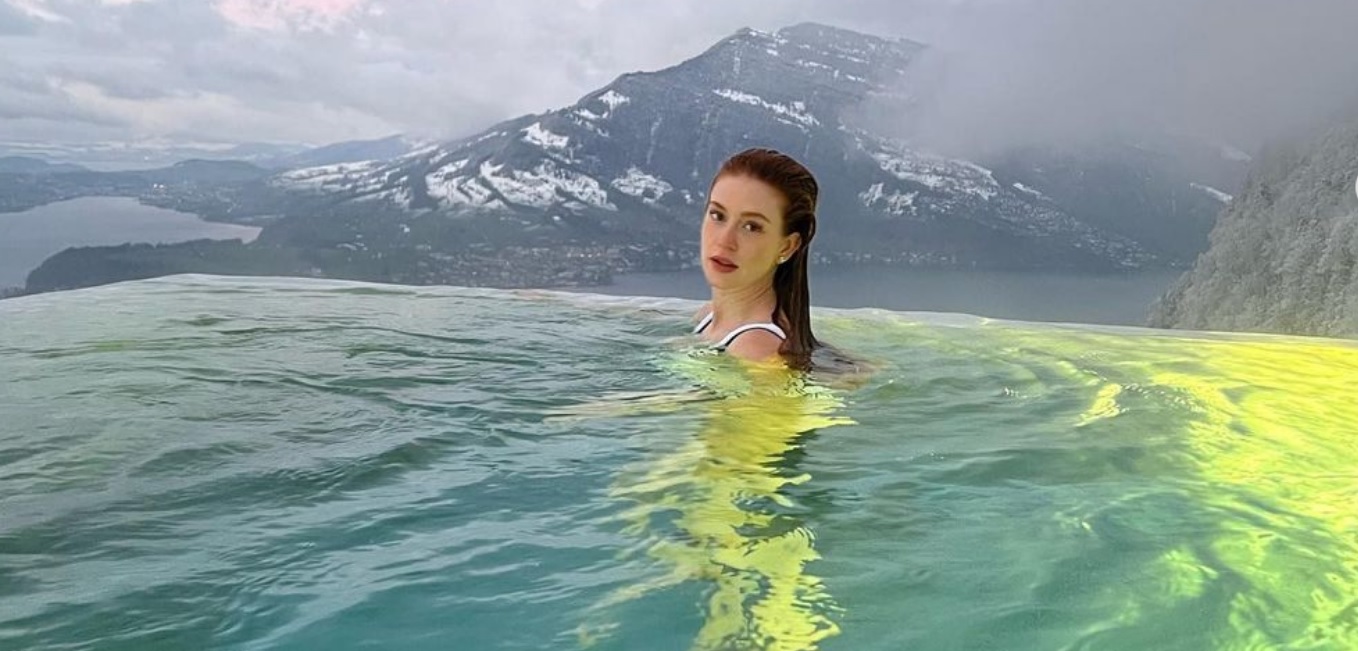 Marina Ruy Barbosa mergulha em piscina luxuosa em meio às montanhas:  ‘sereia na neve'