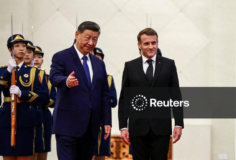 Macron pede a Xi Jinping que ajude a corrigir desequilíbrios comerciais globais "insustentáveis"