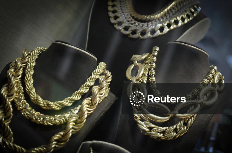 Ouro e prata ampliam perdas após aumento da margem da CME estimular vendas