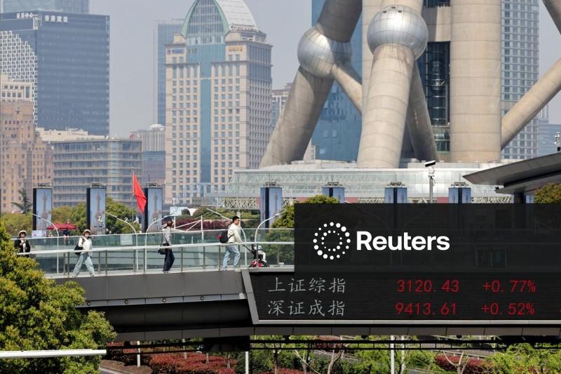 Ações da China fecham em baixa após corte de juros pelo Fed