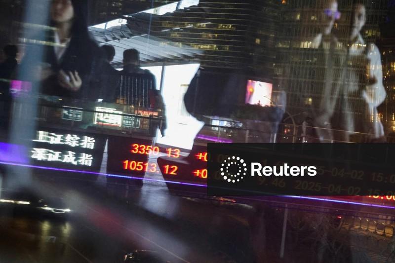 Ações da China caem com pressões deflacionárias; Vanke lidera alta no setor imobiliário