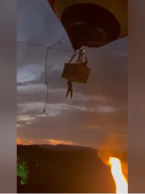 Jovem cai de 3 metros de altura após se pendurar em balão