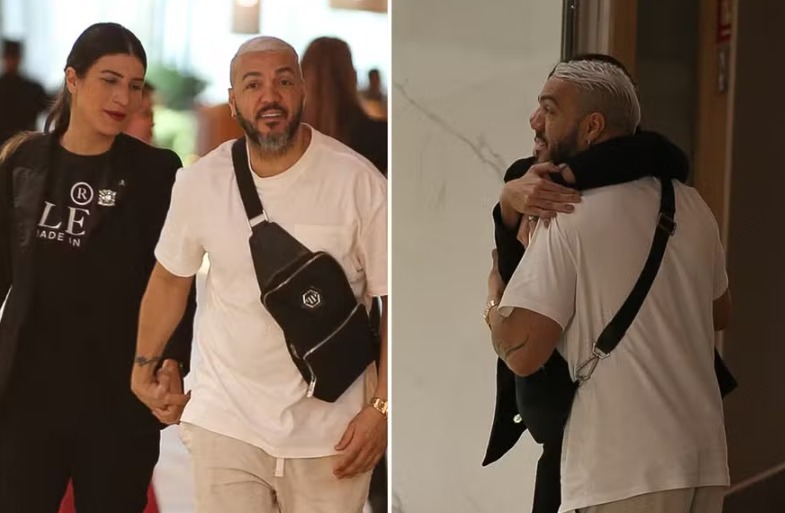 Belo é visto de mãos dadas e trocando carícias com morena em shopping 