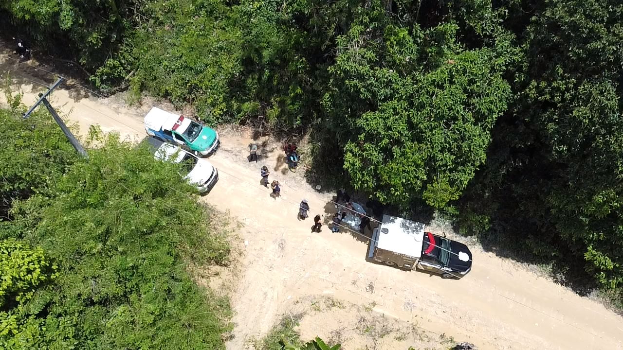 FOTOS: Corpo é encontrado decapitado em área de mata na BR-174
