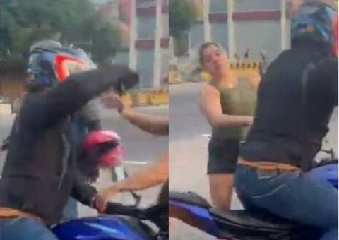Motociclista dá soco em mulher durante briga de trânsito em Manaus; vídeo