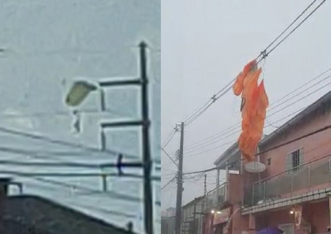 Vídeos: Paraquedista cai em fios de energia durante chuva em Manaus