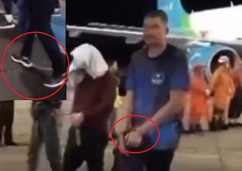 Vídeo mostra deportados dos EUA chegando algemados e com pés acorrentados em Manaus