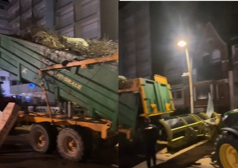 UE-Mercosul: Agricultores prostestam despejando lixo em frente à casa de Macron