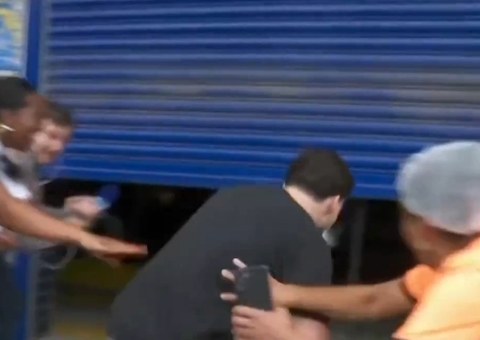 Candidato passa por baixo de portão e consegue entrar no Enem no último minuto; vídeo