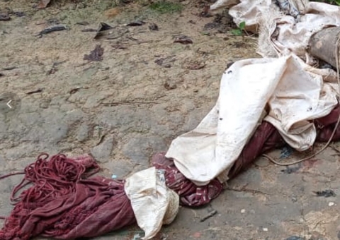 Com recado de criminosos, corpo de homem é encontrado em ramal de Manaus