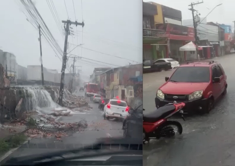 Muro de empresa desaba e ruas ficam alagadas durante chuva em Manaus; vídeo