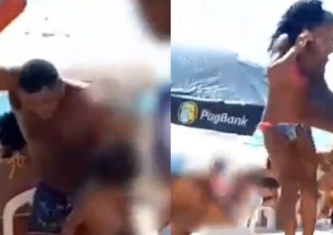 Homem espanca filhas na praia e se justifica após ser atacado na internet; vídeo